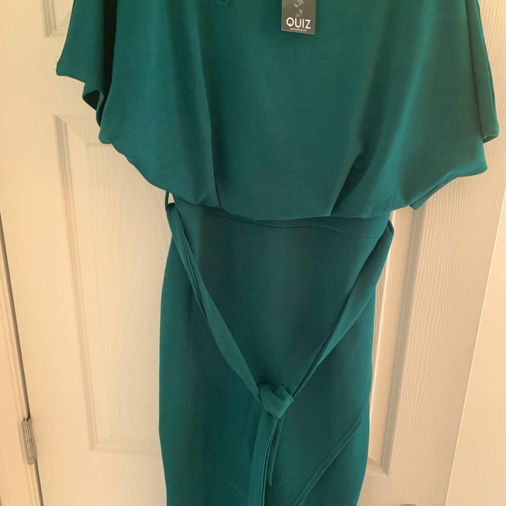 Dress. NEW with tags. Mid length, dark green.